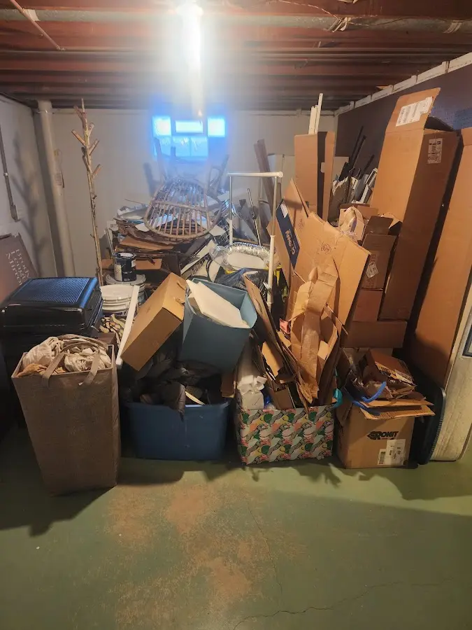 Roll-off dumpster container at job site for Construction Dumpster Rental in Hopkinton